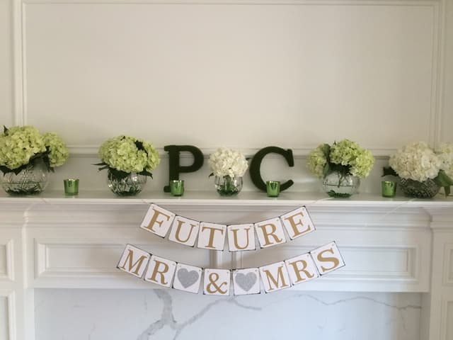 Shower mantel with hydrangea arrangements and a Future Mr & Mrs banner